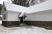 Framing, roofing and exterior finishing on an in-law house - Saratoga County, NY
